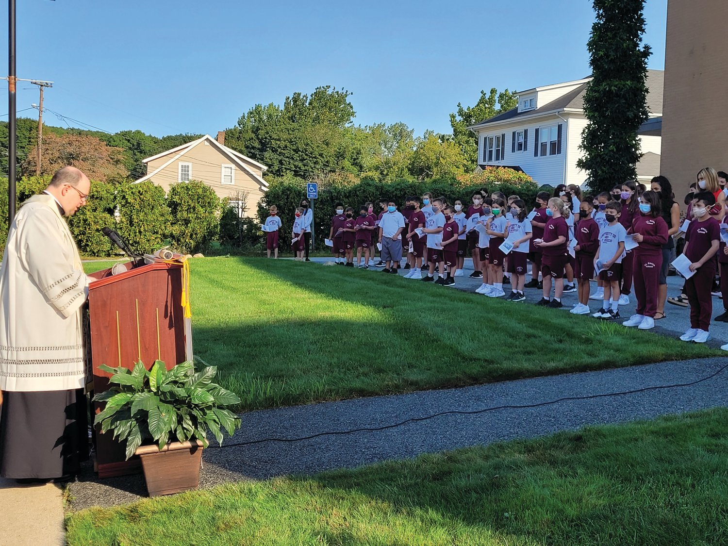 WORDS OF COMFORT: Rev. Angelo N. Carusi, pastor at St. Rocco’s, offered an opening prayer to begin the “Prayer for Peace and Healing on the 20th Anniversary of 9/11.”